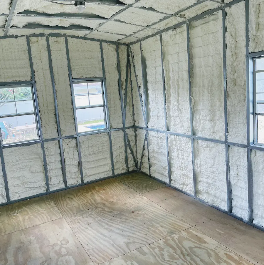 Closed-cell spray foam insulation applied to wall cavities in a residential project in Long Hill